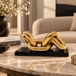 Golden Chain Sculpture on Marble Table