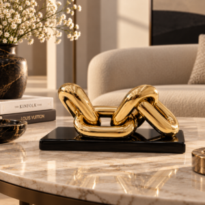 Golden Chain Sculpture on Marble Table