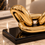 Golden Link Sculpture on Marble