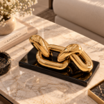 Golden Link Sculpture on Marble Table